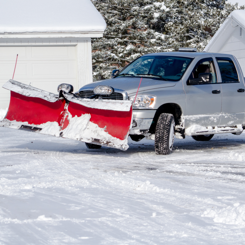 silver truck with snow plow
