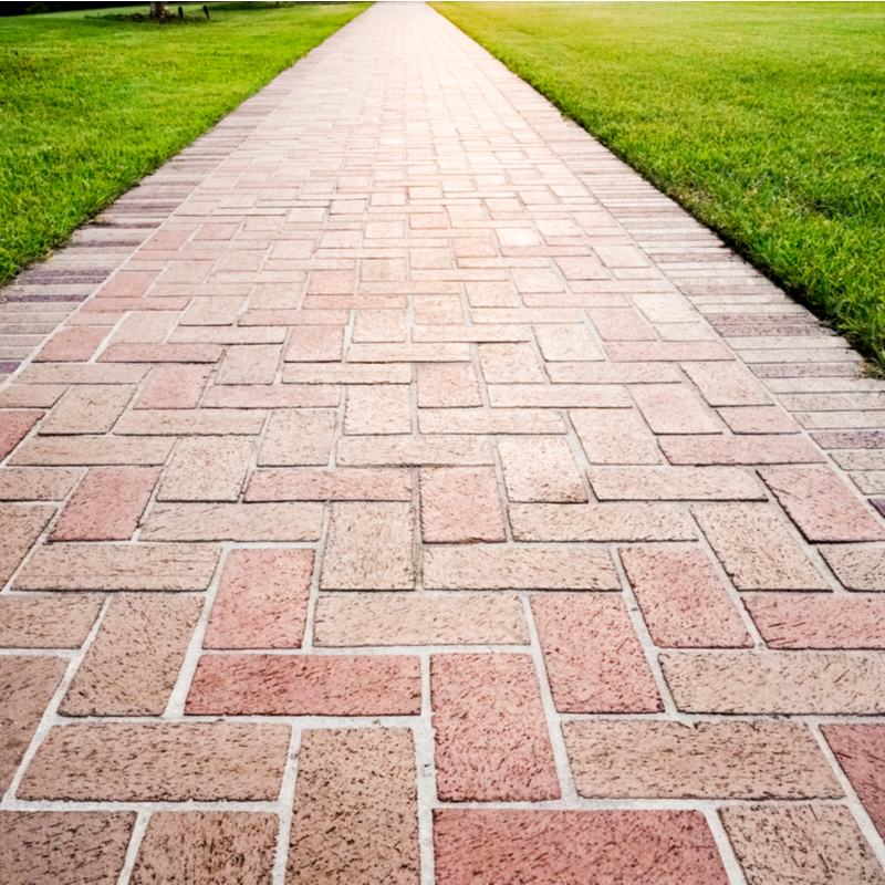 brick paver walkway through a lawn 800